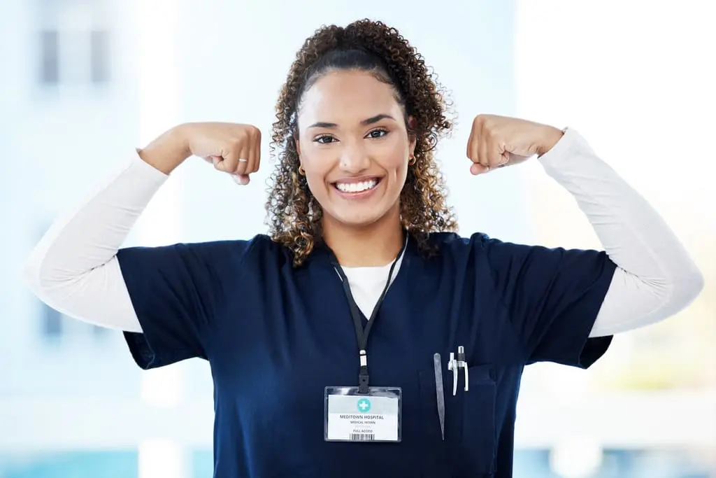 resilient nurse flexing arms
