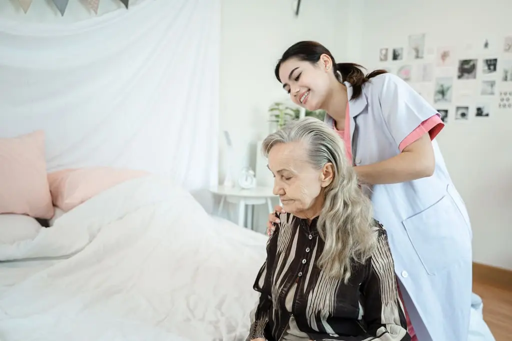 nurse taking care for a lady with complex needs